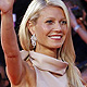 Gwyneth Paltrow, cast member of the movie 'Contagion', waves as she arrives on the red carpet at the Cinema Palace during the 68th Venice Film Festival