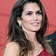 Cindy Crawford and her husband Rande Gerber pose for photographers as they arrive for the opening ceremony of the 68th Venice Film Festival