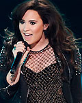 Recording artist Demi Lovato performs 'Give Your Heart a Break' during the VH1 Divas 2012 show in Los Angeles