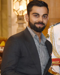 Virat Kohli receives the Padma Shri Award from President Pranab Mukherjee