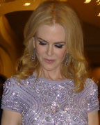 Miramax Films and Weinstein Company co-founder Harvey Weinstein escorts actress Nicole Kidman to their table at the annual White House Correspondents Association dinner in Washington