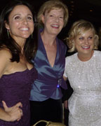 Actresses Julia Louis-Dreyfus and Amy Poehler pose with Democratic U.S. Senator Tammy Baldwin, the first openly gay U.S. Senator in history, at the annual White House Correspondents' Association dinner in Washington