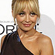 Actress Nicole Richie poses at Elle's 18th Annual Women in Hollywood Tribute in Los Angeles