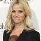 Reese Witherspoon waves at Elle's 18th Annual Women in Hollywood Tribute in Los Angeles