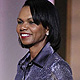 Former U.S. Secretary of State, Condoleezza Rice walks across the stage to present a Woman of the Year award during the 21st annual Glamour Magazine Women of the Year award ceremony