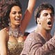 Mallika Sherawat and Akshay Kumar perform on stage during the Zee Cine Awards.