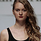 Models present creations by Russian designer Tanya Arzhanova during Belarus Fashion Week 'Spring-Summer 2012' in Minsk