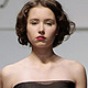 Models present creations by Russian designer Tanya Arzhanova during Belarus Fashion Week 'Spring-Summer 2012' in Minsk