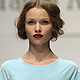 Models present creations by Russian designer Tanya Arzhanova during Belarus Spring-Summer 2012 Fashion Week in Minsk