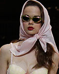 Models present creations by Hunkemoeller at Berlin Fashion Week Spring-Summer 2013 in Berlin