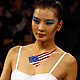 A model presents a creation by US fashion label KangaROOS during China Fashion Week in Beijing