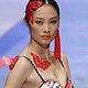 Models present creations for the 'Ordifen Cup,' during China Fashion Week in Beijing