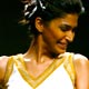Models present creations by Indian designer Anita Dongre at the Wills Lifestyle India Fashion Week