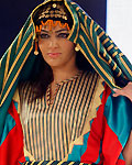 A model presents Bedouin dress creation by Society for the Development and Rehabilitation for the Rural Woman at Amman at 09 Nov