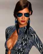 A model presents a creation from Triya 2013-2014 summer collection during Rio Fashion Week in Rio de Janeiro