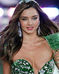 Model Miranda Kerr presents a creation during the Victoria's Secret Fashion Show in New York