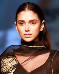 Aditi Rao walks the ramp for the label Raw Mango during the inaugural show