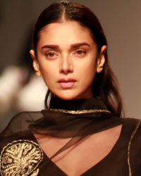 Aditi Rao walks the ramp for the label Raw Mango during the inaugural show