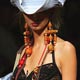 A model stands at the end of the catwalk during a showing of designs by Mimco at the Australian Fashion Week in Sydney.