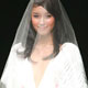 A model presents a creation by a Thai graduate designer during Bangkok Fashion Week 2005 in Bangkok.