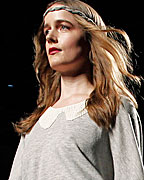 A model presents a creation from TCN collection at the Pasarela 080 Barcelona Fashion Show