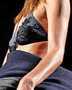 A model presents a creation from TCN collection at the Pasarela 080 Barcelona Fashion Show