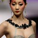 A model presents a creation for `Ordifen Cup` 2008 Lingerie Innovative Design Contest at China Fashion Week