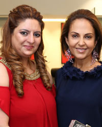 Krishaa Ghanasingh and Sangeeta Assomull of Judith Leiber