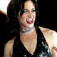 Italian actress Asia Argento poses during red carpet arrivals in Cannes.