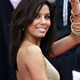 Actress Eva Longoria poses during red carpet arrivals in Cannes.