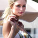 Paris Hilton poses during photocall on the Carlton Hotel pier during 58th Cannes Film Festival.