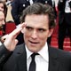 US actor Matt Dillon salutes during arrivals for US director Jarmusch's film 'Broken Flowers' at 58th Cannes Film Festival.