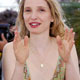 French actress Julie Delpy poses during photocall for 'Broken Flowers' at 58th Cannes Film Festival.