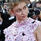 French actress Emmanuelle Beart poses during red carpet arrivals at Cannes Film Festival.