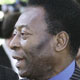 Brazilian soccer legend Pele arrives during red carpet arrivals at the Cannes Film Festival.