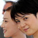 Japanese actresses Fusako Urabe (R) and Nene Otsuka pose during a photo call for Japanese director Masahiro Kobayashi's film 'Bashing' at the 58th Cannes Film Festival.