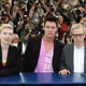 U.S. director Woody Allen poses with cast members U.S. actress Scarlett Johansson, British actor Jonathan Rhys Meyers and British actress Emily Mortimer during a photocall for his film 'Match Point' in Cannes.