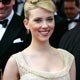 US actress Johansson poses during red carpet arrivals for the out of competition screening of US director Allen's film Match Point at the 58th Cannes Film Festival.