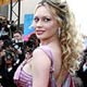 Photographers take pictures of an unidentified guest during red carpet arrivals for an out of competition screening of US director Allen's film Match Point at the 58th Cannes Film Festival.