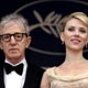 US director Allen poses with US actress Johansson during red carpet arrivals for the out of competition screening of his film Match Point at the 58th Cannes Film Festival.