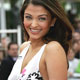 Aishwarya Rai waves during red carpet arrivals for the out of competition screening of US director Allen's film Match Point at the 58th Cannes Film Festival.