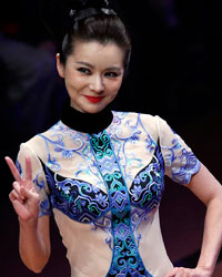 A model presents a creation from NE-TIGER Haute Couture Collection at China Fashion Week S/S 2014 in Beijing