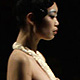 Models present creations from the AS August Silk Guo Baobao collection during China Fashion Week in Beijing