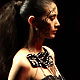 A model presents a creation from the GIOIA PAN Spring/Summer 2012 collection during China Fashion Week in Beijing