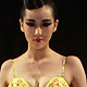 A model present creations for the NE TIGER 2012 Haute Couture collection during China Fashion Week in Beijing