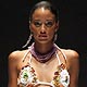 A model displays a creation by Ecliptica at a fashion show during the Dominicana fashion week in Santo Domingo