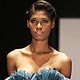 Models display creations by Carolina Herrera during the Dominicana Moda fashion week 2009 in Santo Domingo