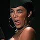 A model gestures as she displays a creation by Puerto Rico designer Ecliptica during the Dominicana fashion week in Santo Domingo