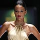 A model displays a creation by Trinidad and Tobago designer Meiling at a fashion show during the Dominicana fashion week in Santo Domingo