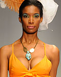 A model displays a creation by aJeante (Antigua and Barbuda) during the Dominicana Moda Fashion Week 2012 in Santo Domingo